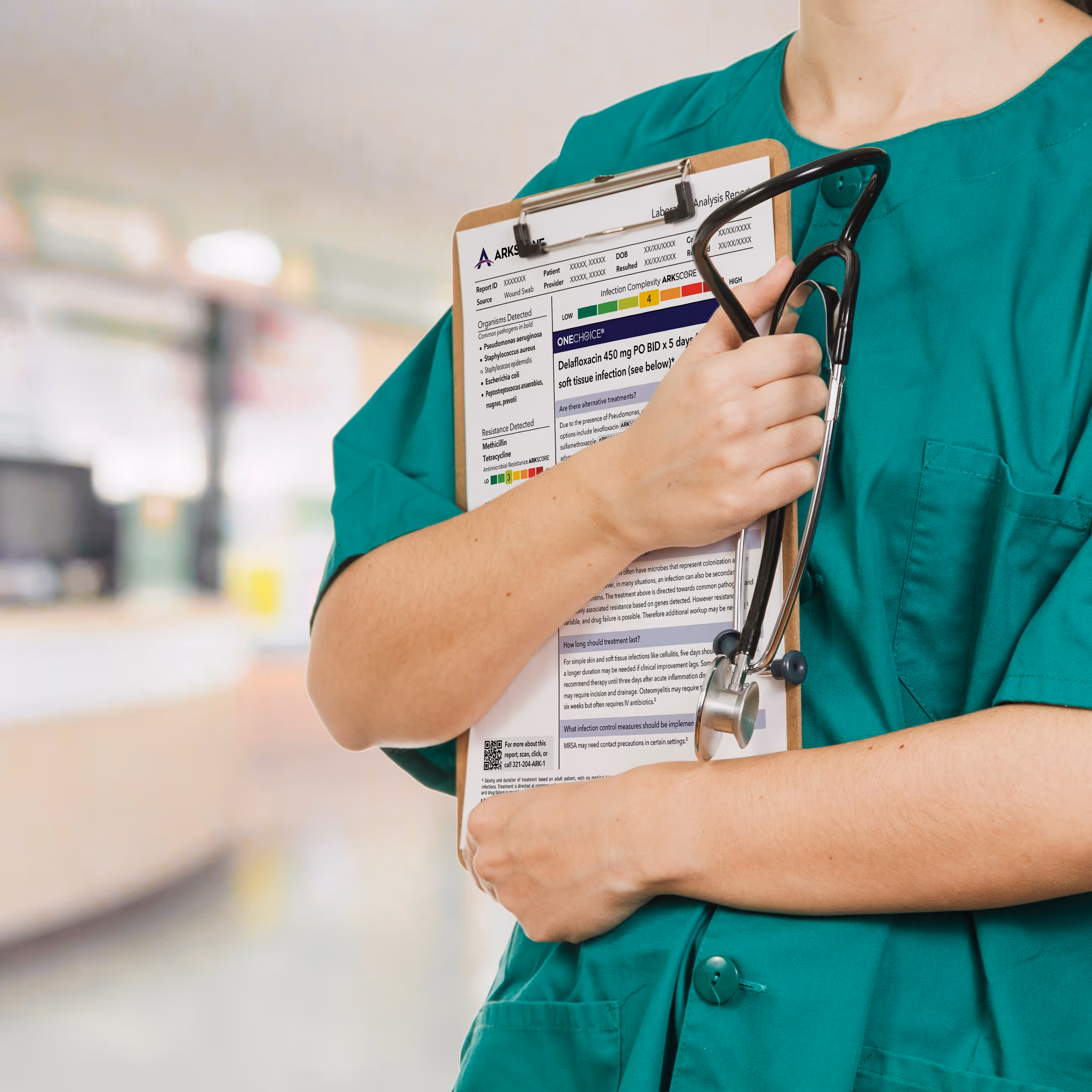 A nurse holding a copy of the OneChoice report.