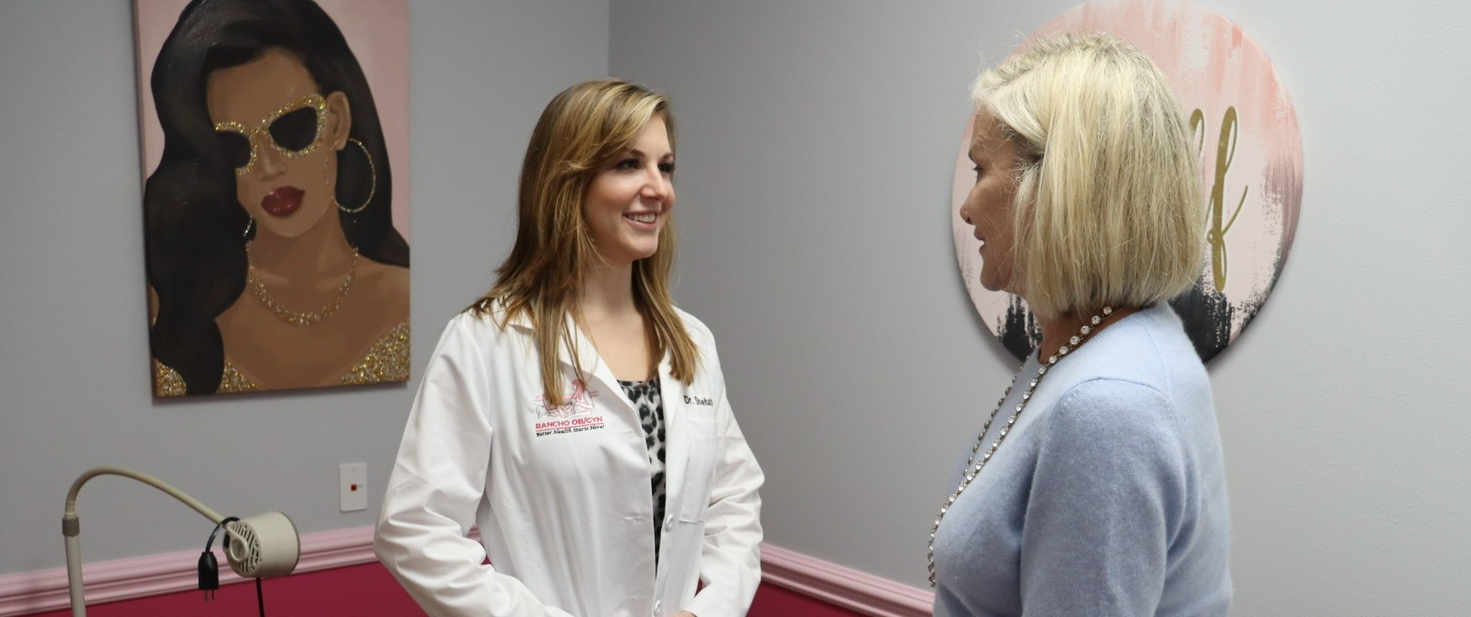 A woman talking to her doctor