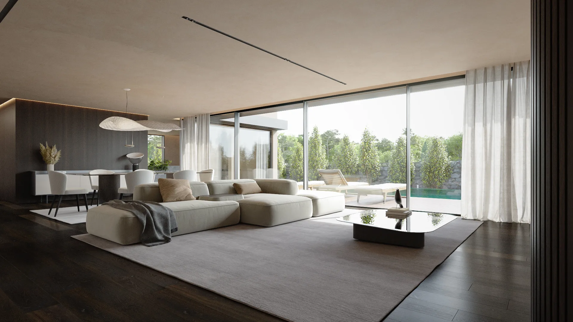 Sala de estar moderna com sofá bege, mesa de centro espelhada, sala de jantar ao fundo e grandes janelas de vidro com vista para um jardim e piscina.