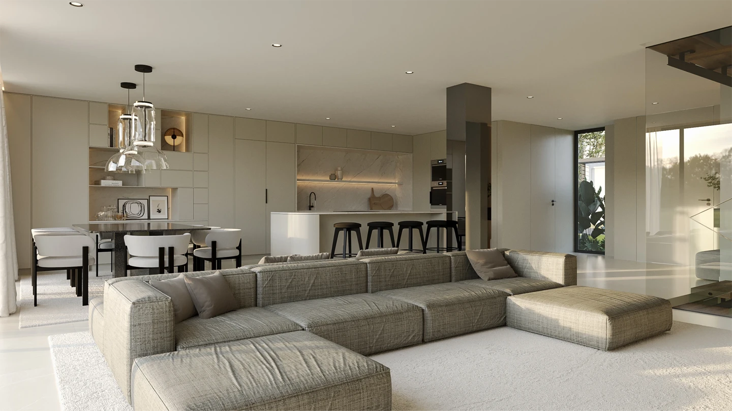 Sala de estar moderna com sofá bege, mesa de centro escura com livros e xícara, TV embutida na parede e vasos decorativos com galhos secos.