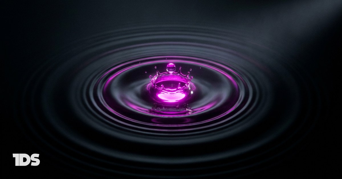 A magenta droplet striking black water with ripples spreading to the frame edge, representing the 80/20 content distribution rule
