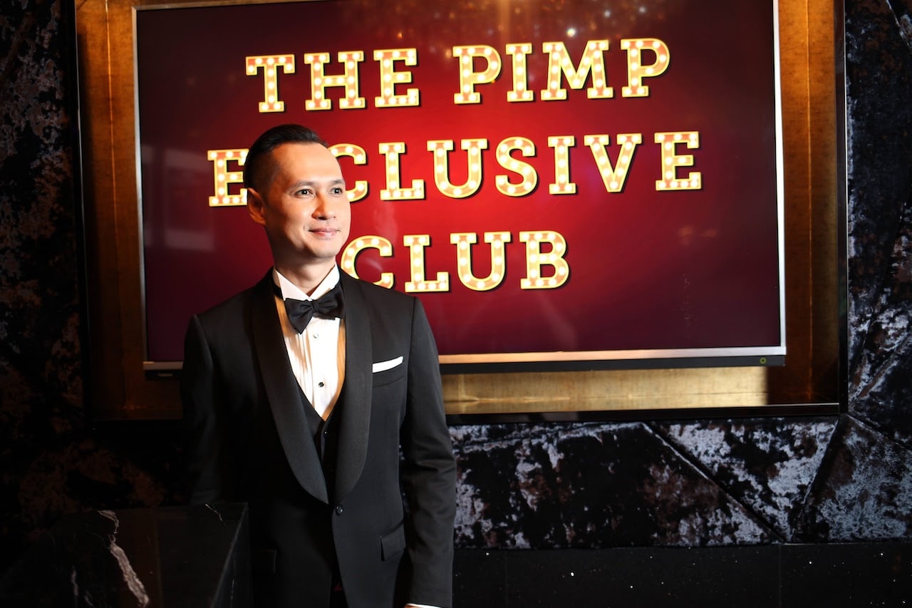 The PIMP Exclusive club sign and host