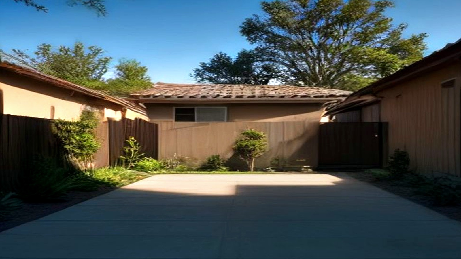 Photoreal Encino two-unit house and materials for an SB9 budget review, no people or dollar signs