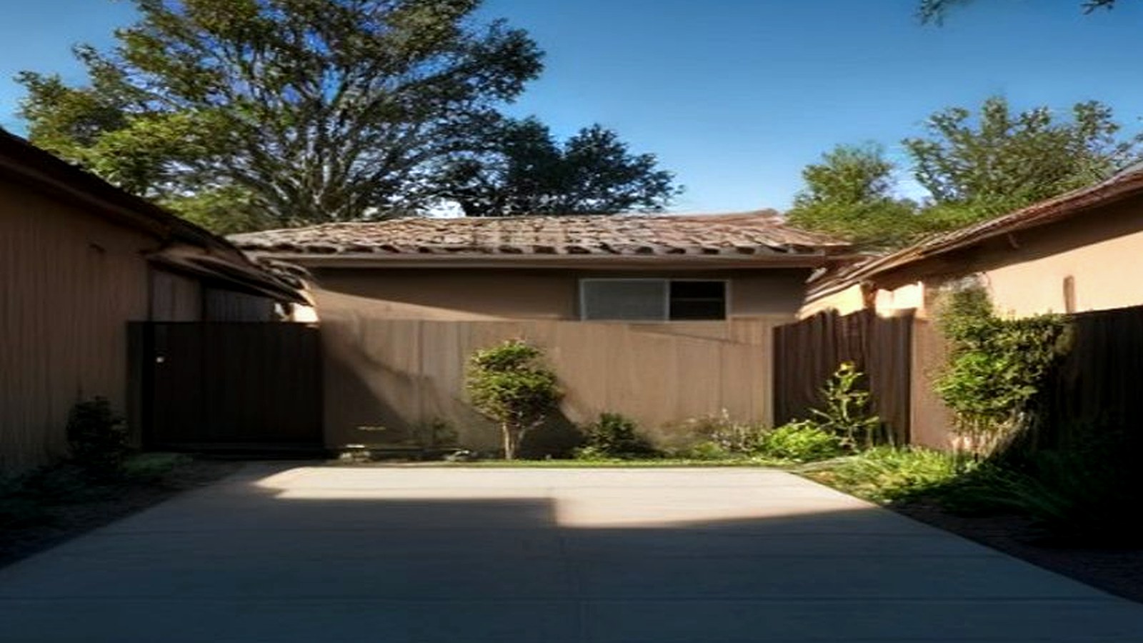 Photoreal Encino custom house exterior matching architect-led residential design, no text