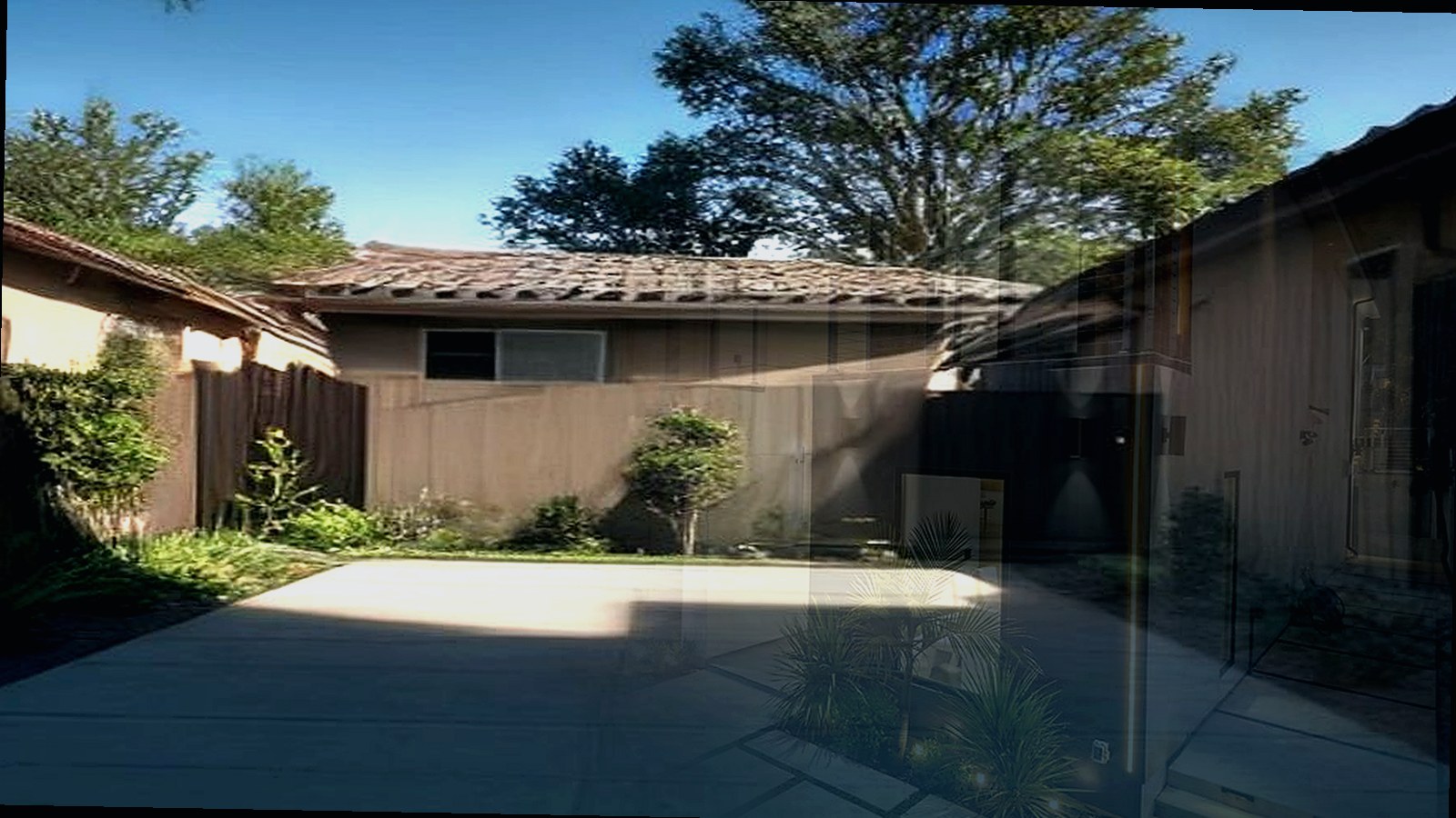 Photoreal architect reviewing custom home drawings for an Encino Los Angeles house, no logos