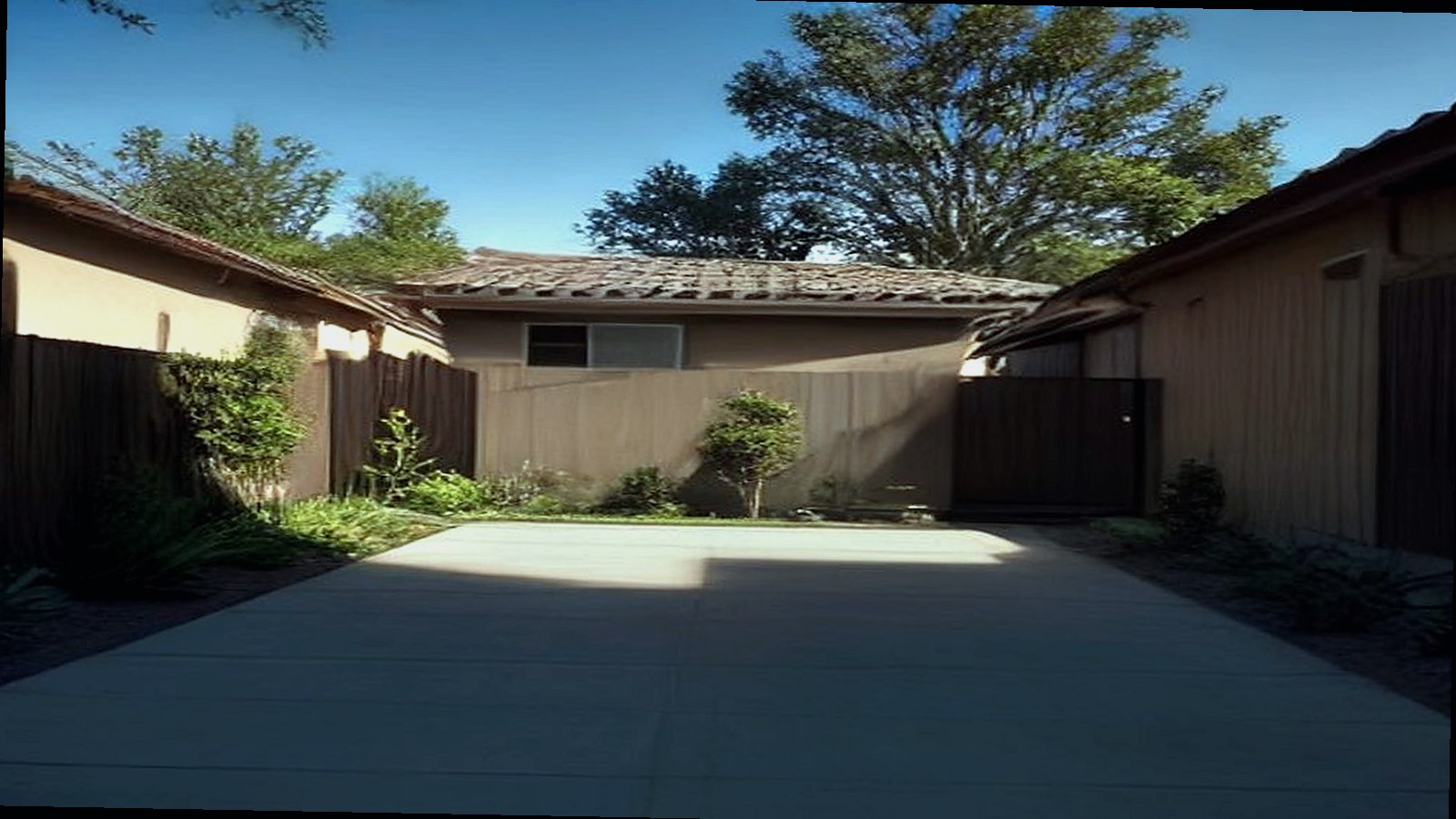 Photoreal architect reviewing custom home drawings for an Encino Los Angeles house, no logos