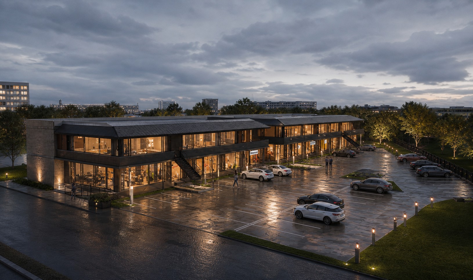 Aerial dusk rendering of the Lyons Equity two-story office building with illuminated storefronts and parking in Santa Clarita