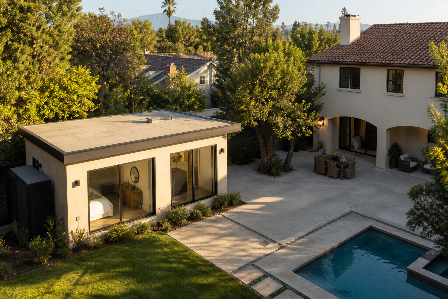 Encino backyard with a new one-story detached ADU beside the main house