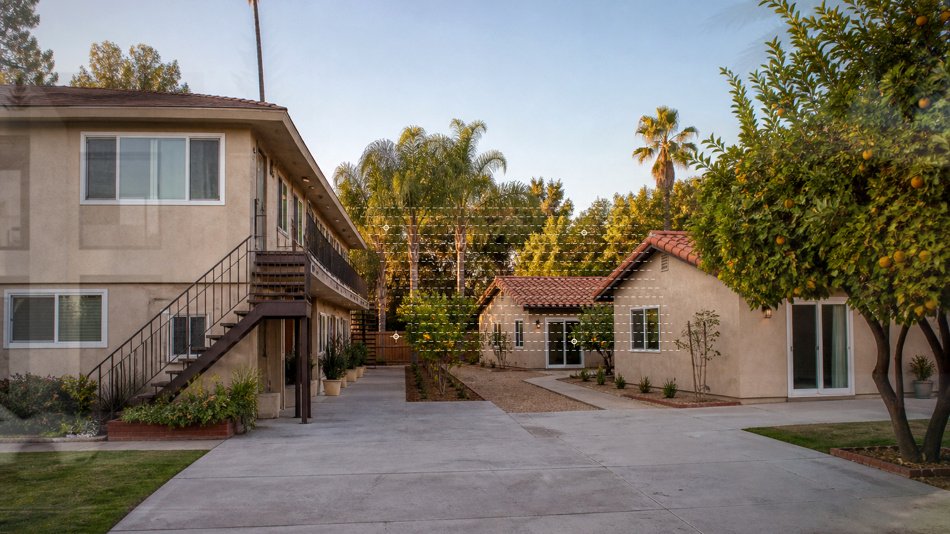 Encino residential lot with survey and parcel-split planning markers, professional architecture photo, no text or logos