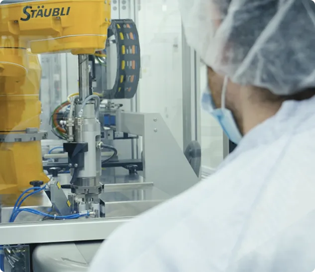 lab technical with machinery