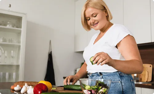 woman chopping vegetables