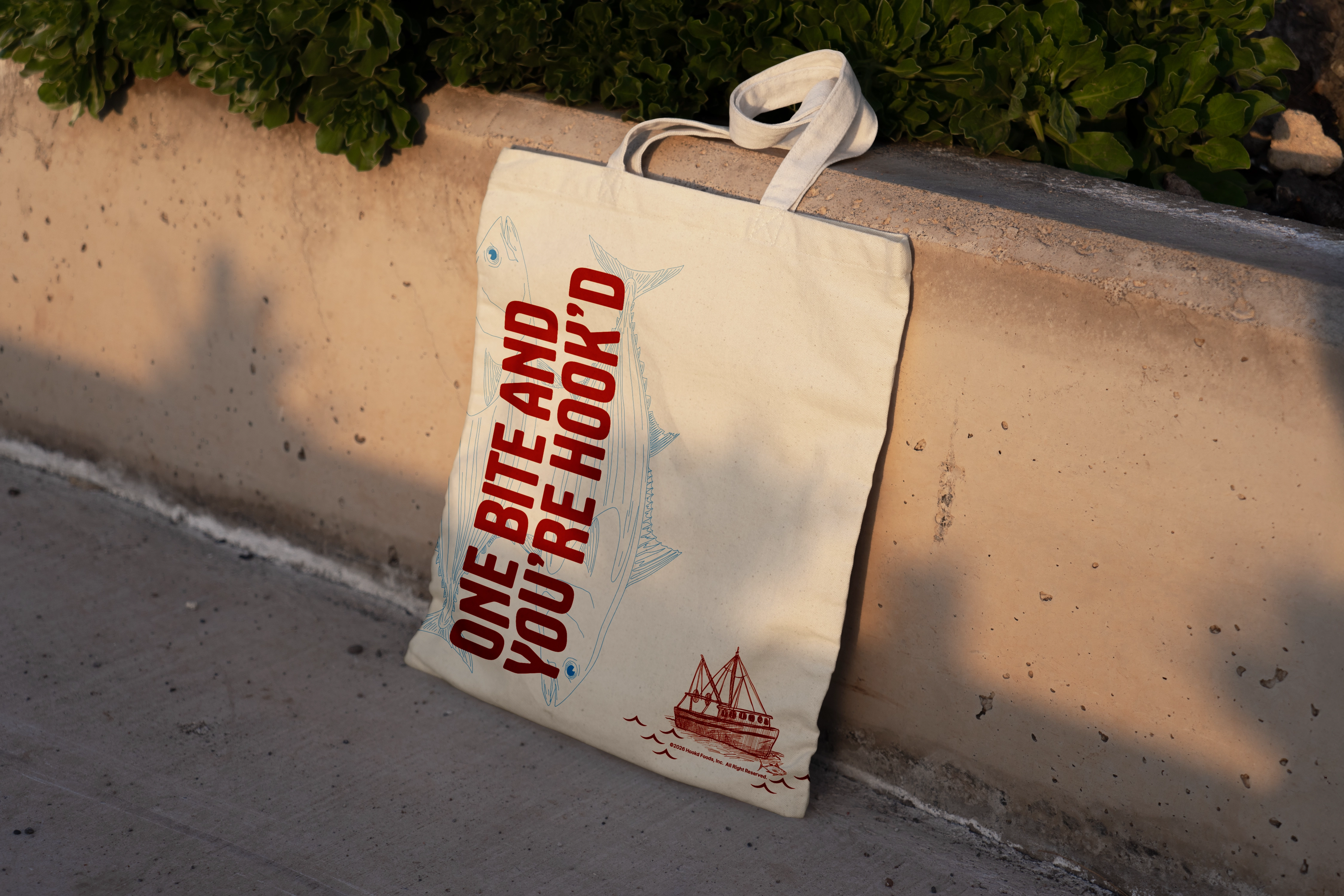 Hookd wild-caught albacore tuna can showing sustainably troll-caught labeling and 7.5 oz net weight.