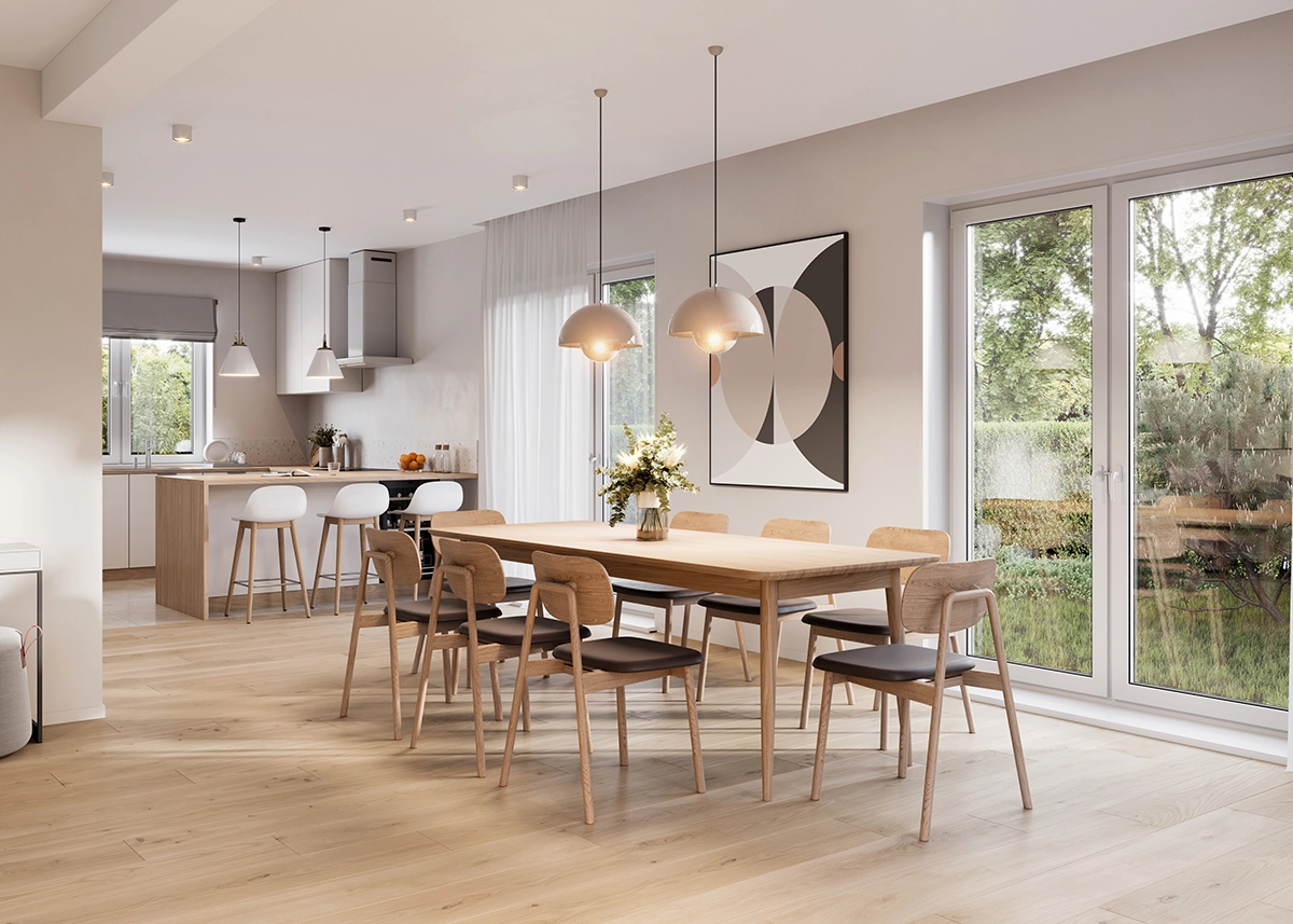 Bright open dining and kitchen area with pendant lighting
