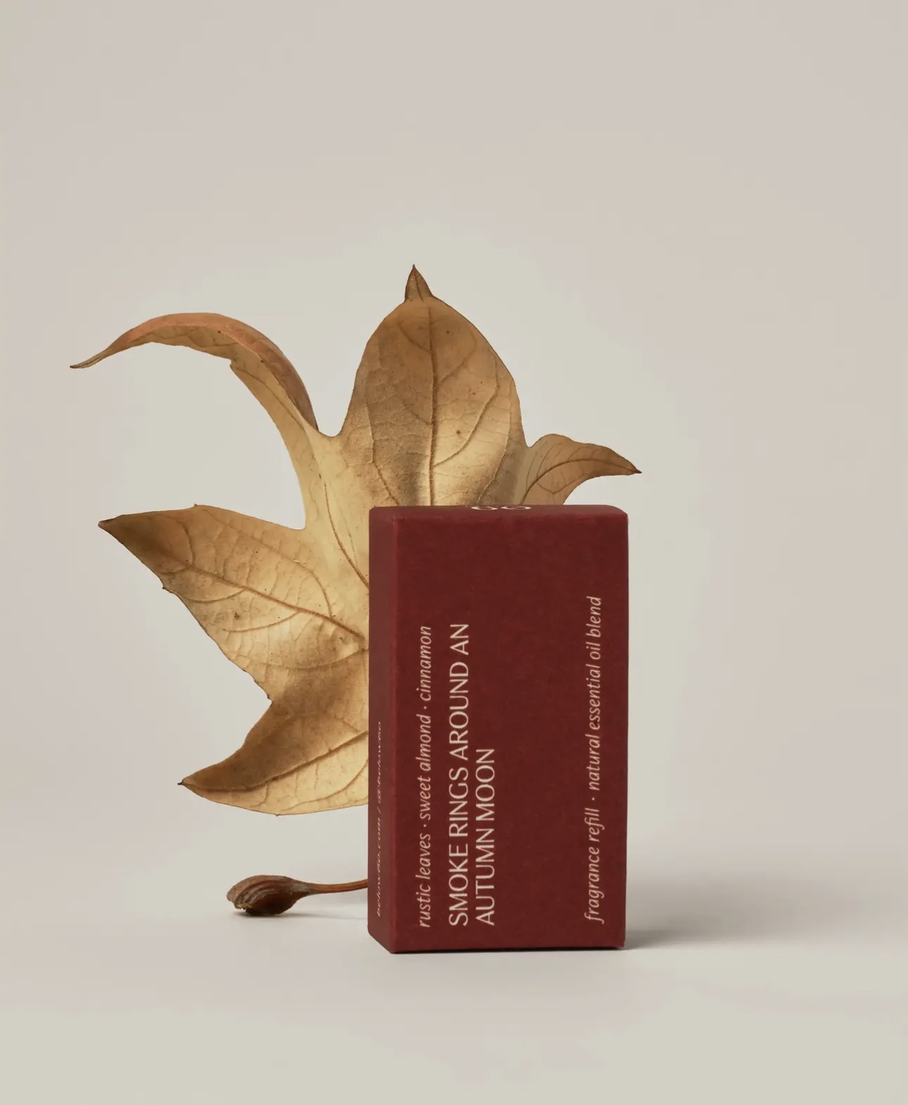 Below 60-Smoke rings around an autumn moon- fragrance