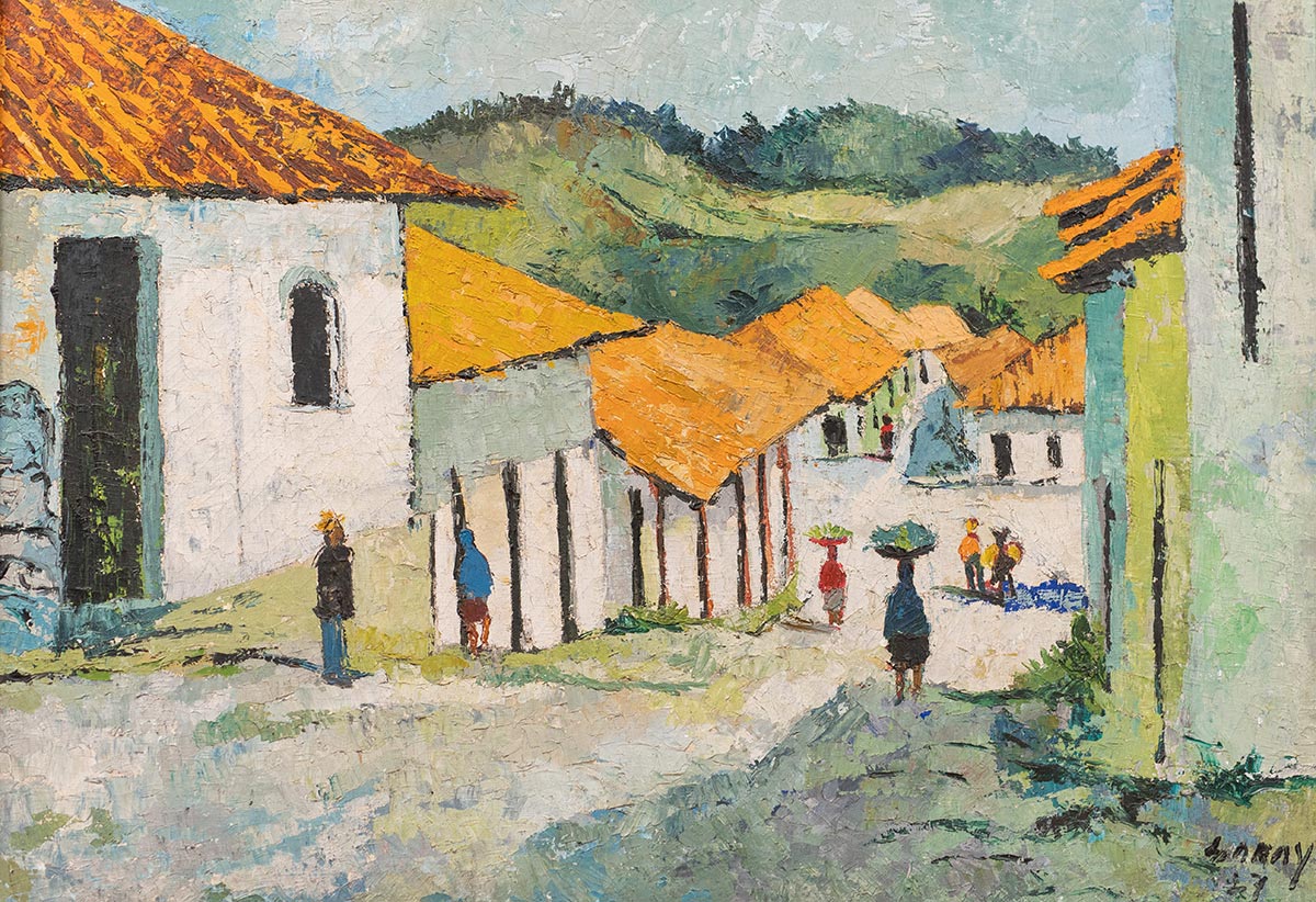 Painting of a village street with white houses, orange-tiled roofs, hills in the background, and people walking carrying baskets on their heads.