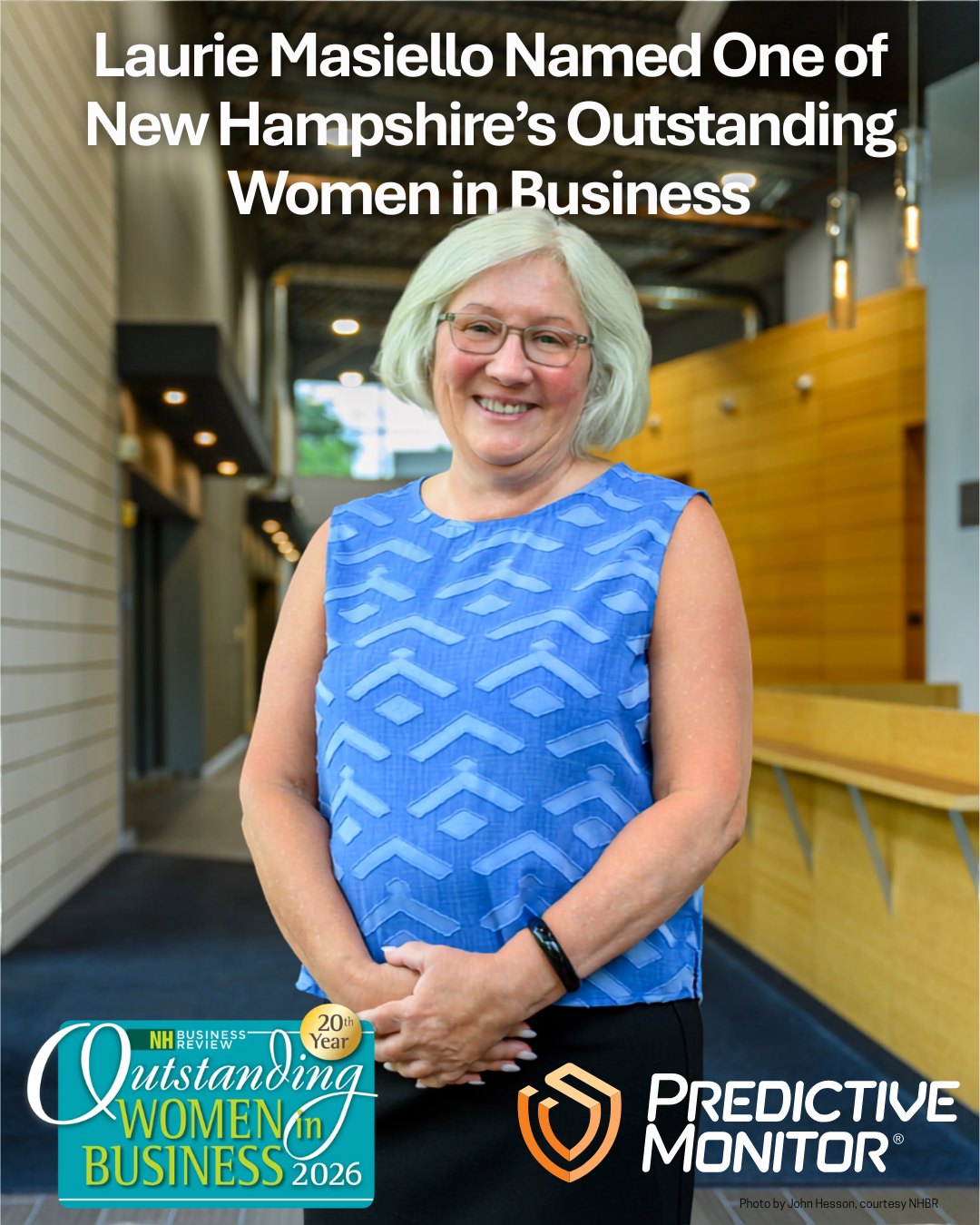 Laurie Masiello at Predictive Monitor's Nashua headquarters, with the New Hampshire Business Review Outstanding Women in Business 2026 award badge