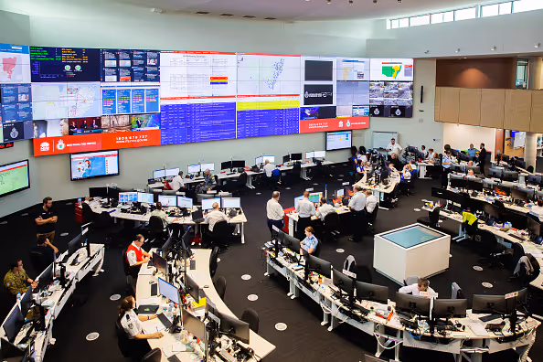 Control Room with Computer Screens showcasing ARENA in use