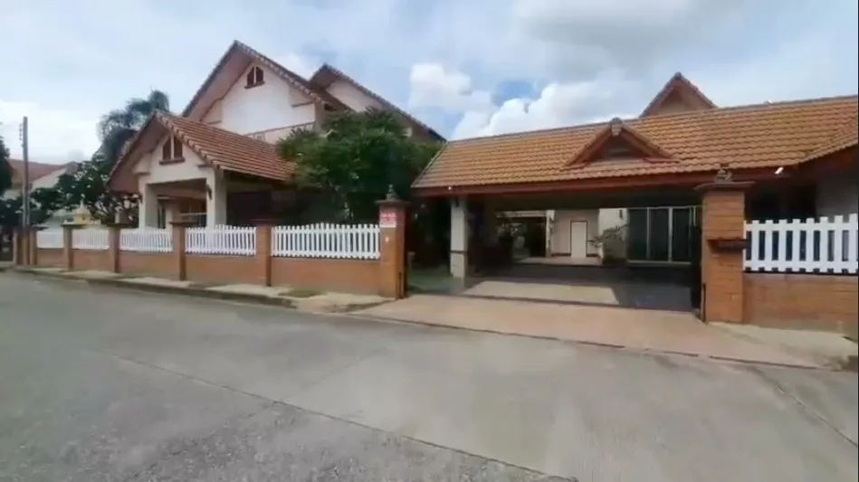 Roadside image of this spacious seven bedroomed house in the beautiful development of Lanna Thara