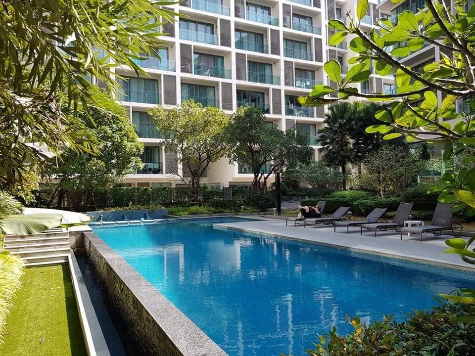 External building photo of the modern luxury, spacious 2 bedroom, 2 bathroom, 120 Sq. m condo in the heart of Nimman Road