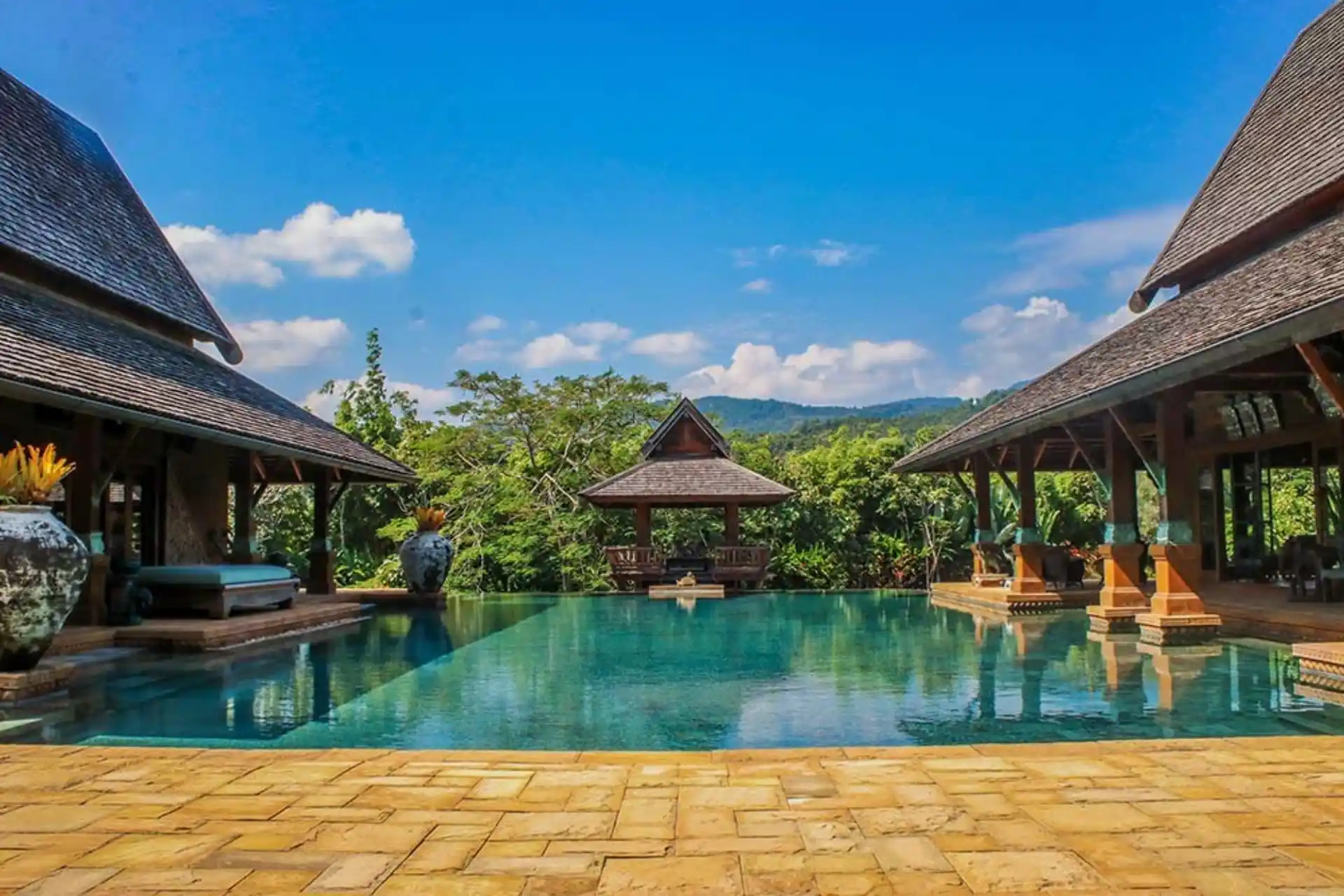 Mae Rim Chiang Mai luxury villa with infinity pool, traditional Thai pavilions, tropical garden, and mountain views, Thailand