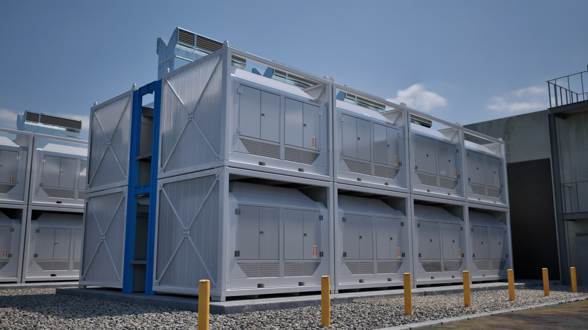 Industrial HVAC units stacked in two rows on a gravel platform under a clear blue sky.
