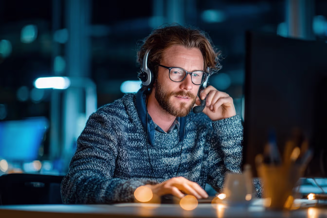 IT professional addressing query at help desk