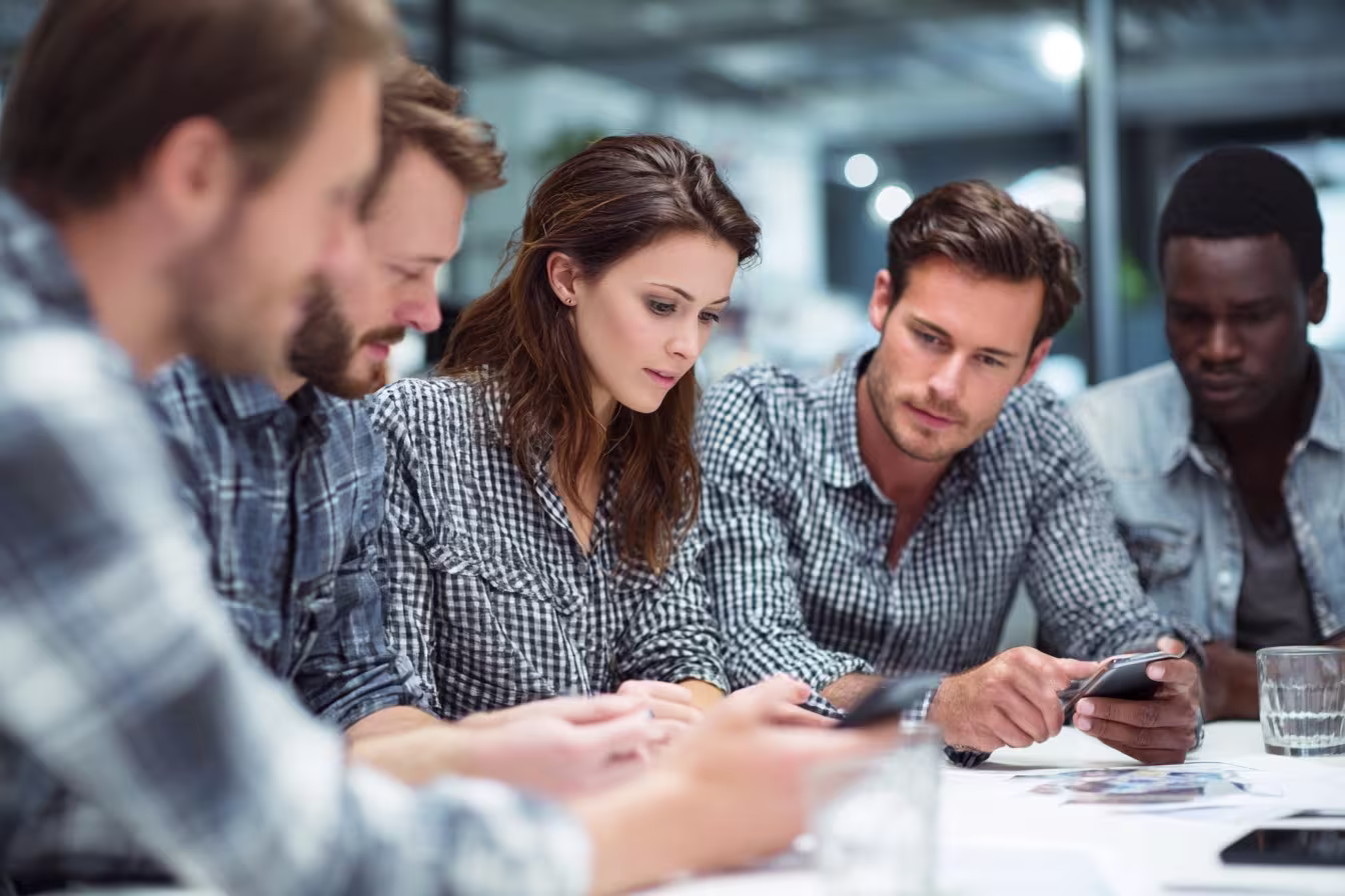 Inclusive team discussing mobile device management