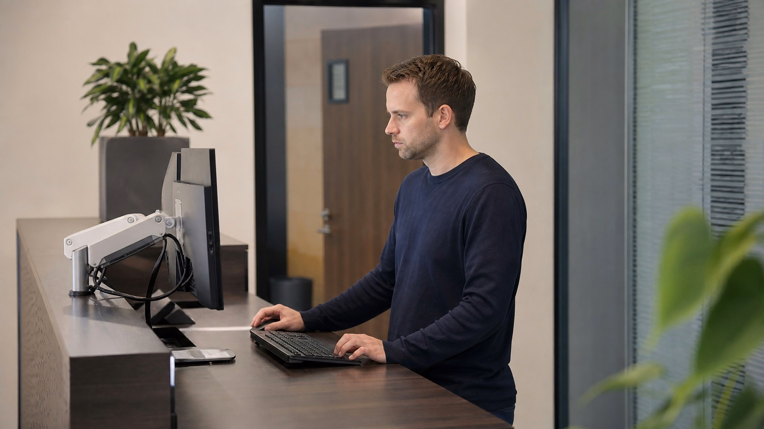 RECEPTION AREA An IT professional one person standing at a front reception d