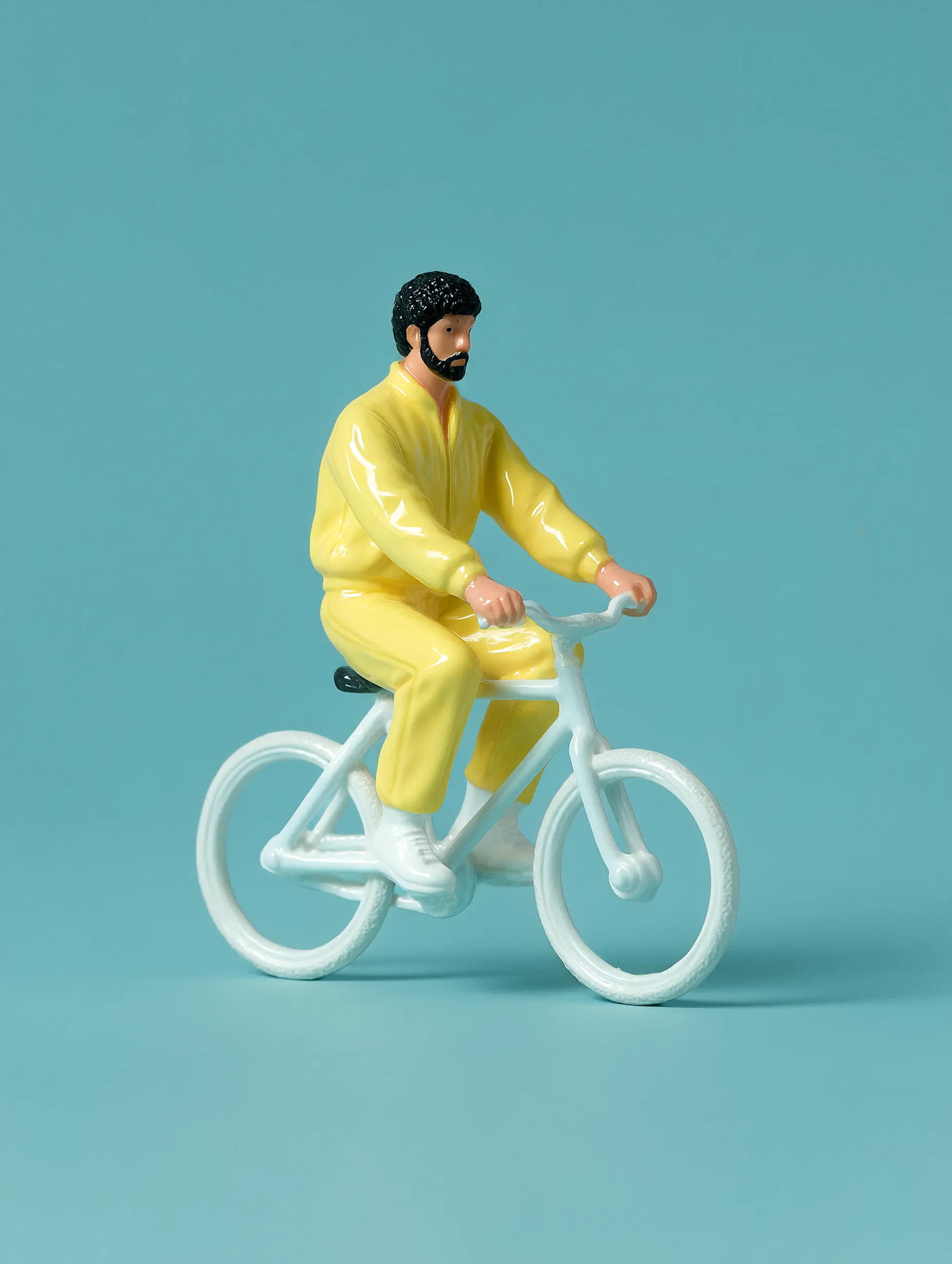 OWWO branded full body picture of Jaime Fernandez, styled as a porcelain figurine.