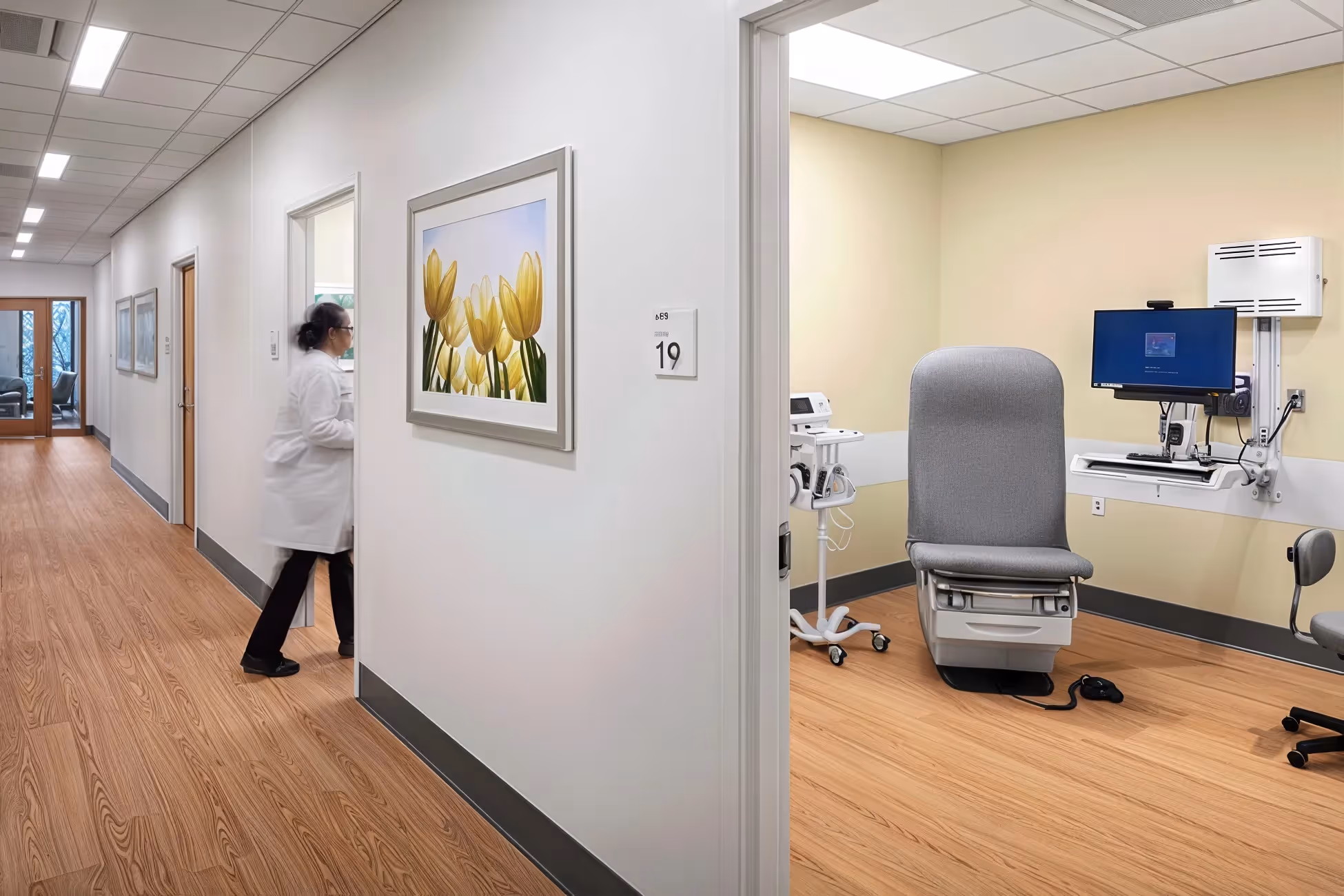 Exam room with chair and monitor in clinic