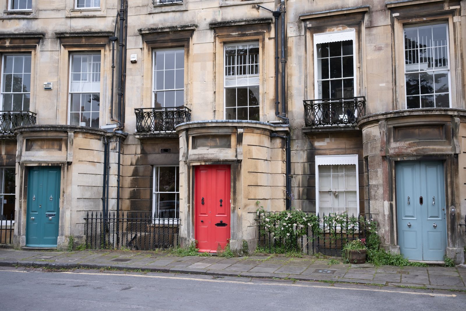 Georgian terraced houses with colourful front doors