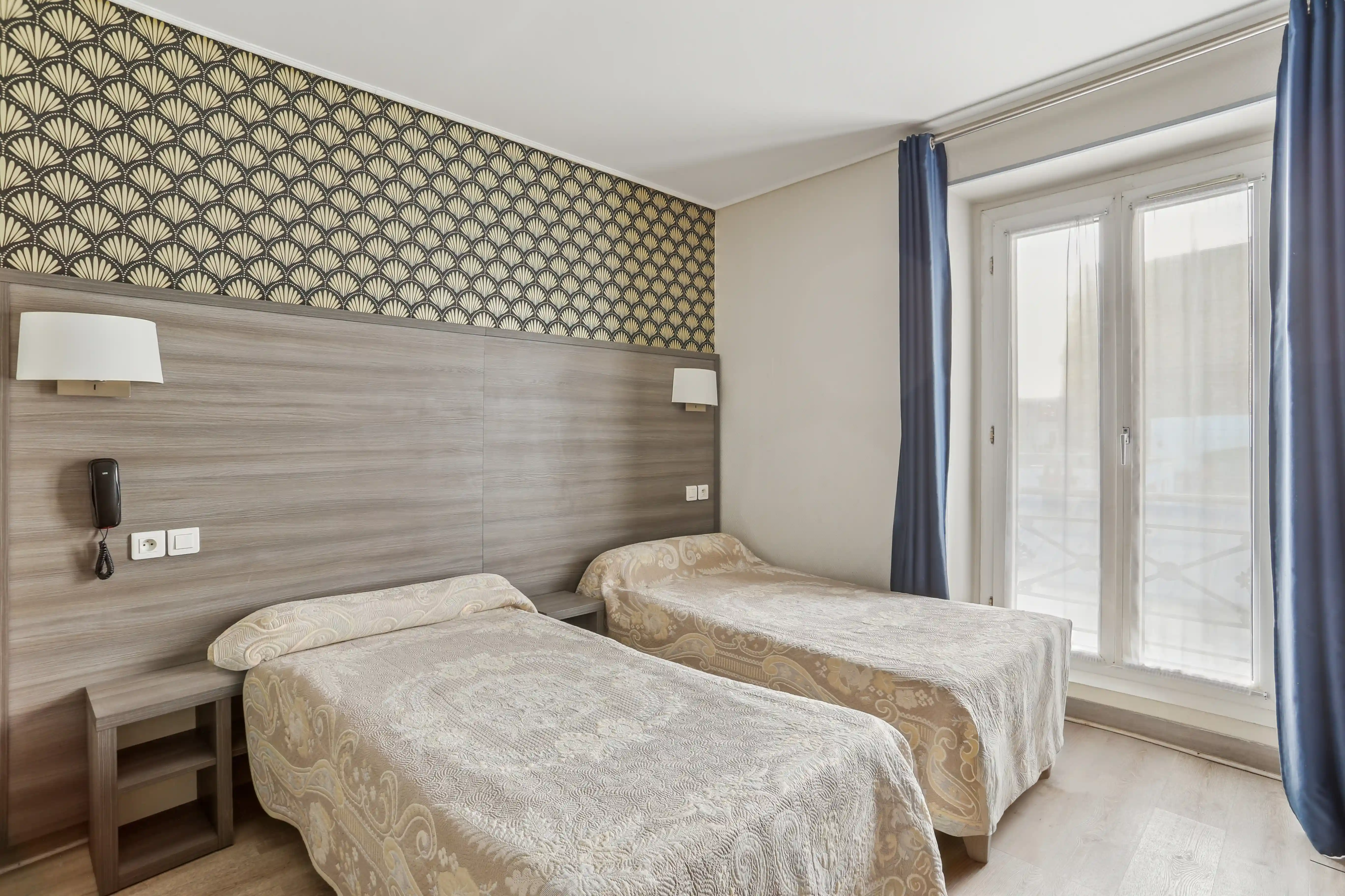 Chambre appartement 3 pièces North Paris Suite