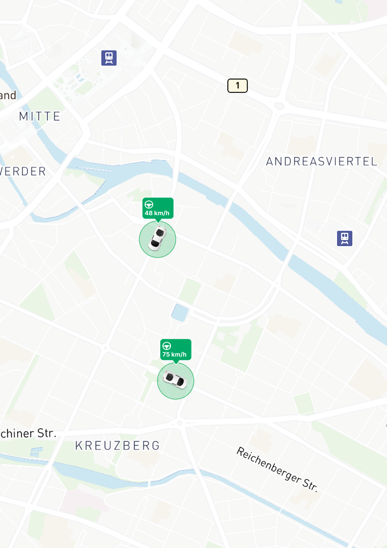 FleetOnAir map view showing real-time vehicle locations and speed indicators.
