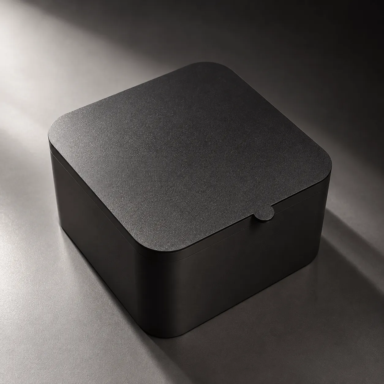 Black rectangular carrying case with handles and the word NUVIE printed on it.