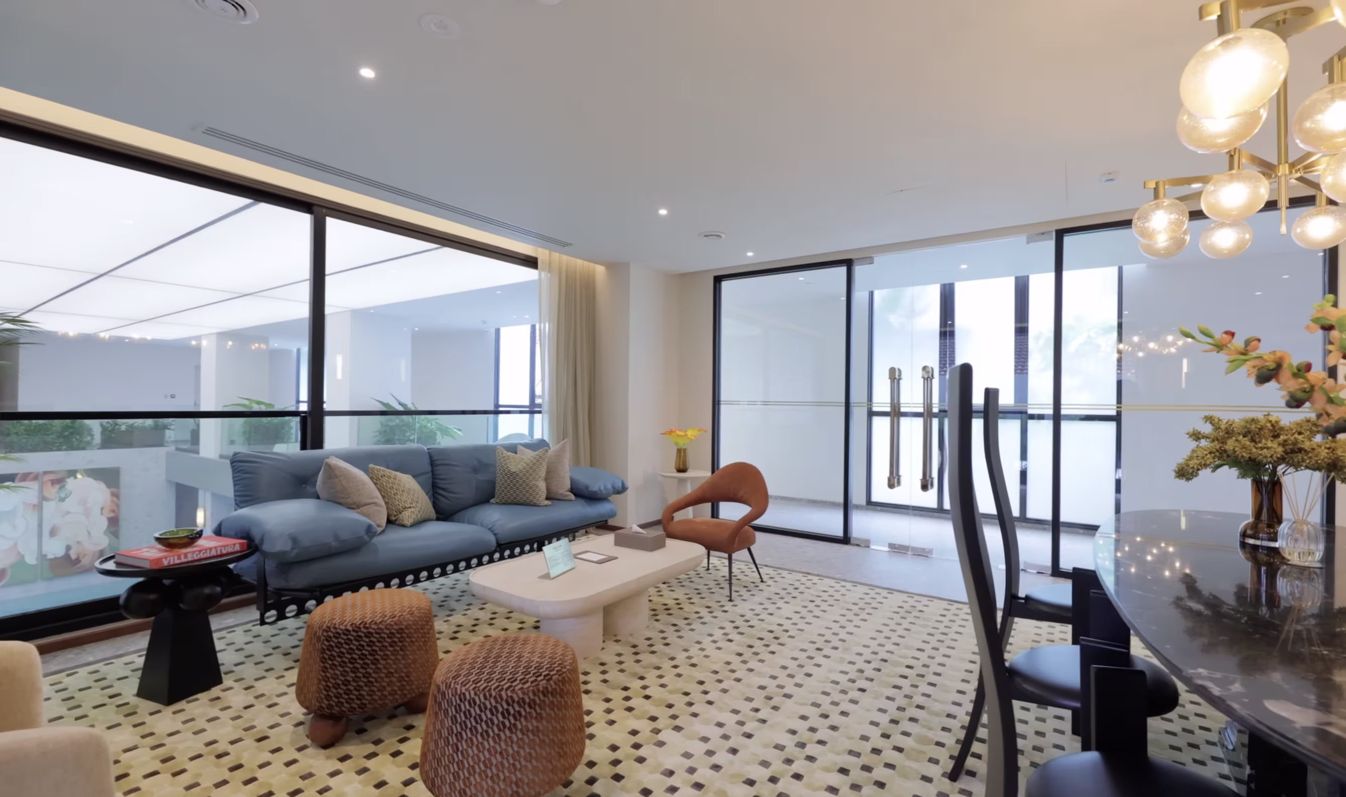 Via 34 club lounge with seating and work areas