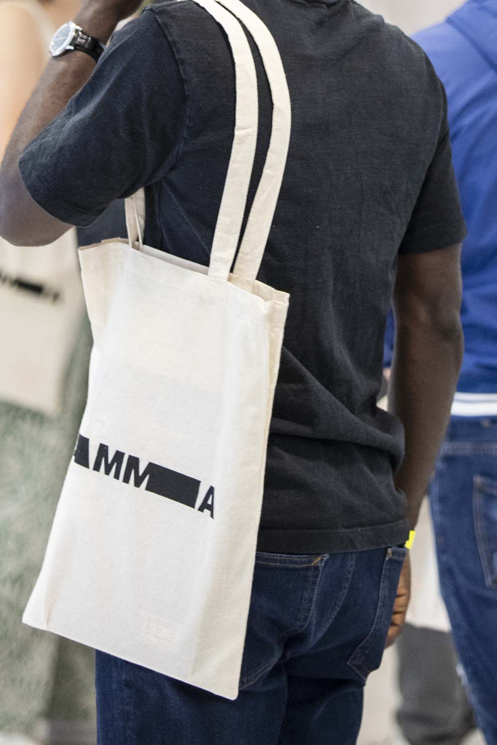 Man wearing tote bag