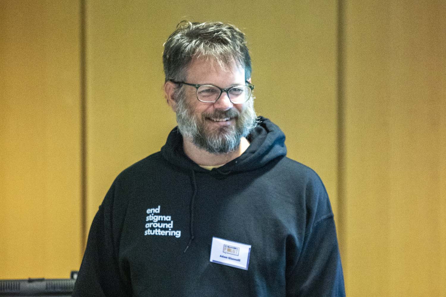 Man smiling during workshop