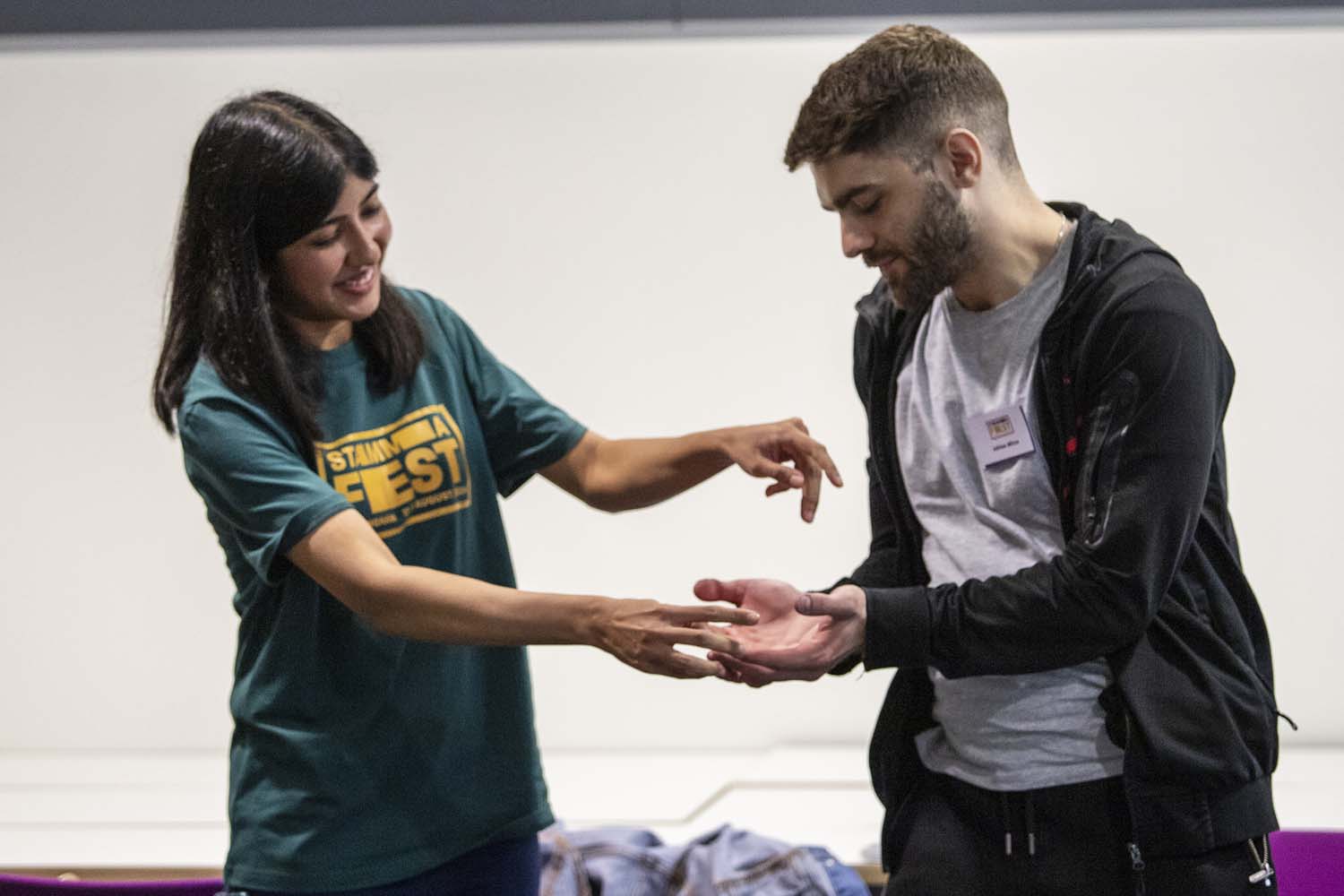 Workshop Bhupinder holding man's hands