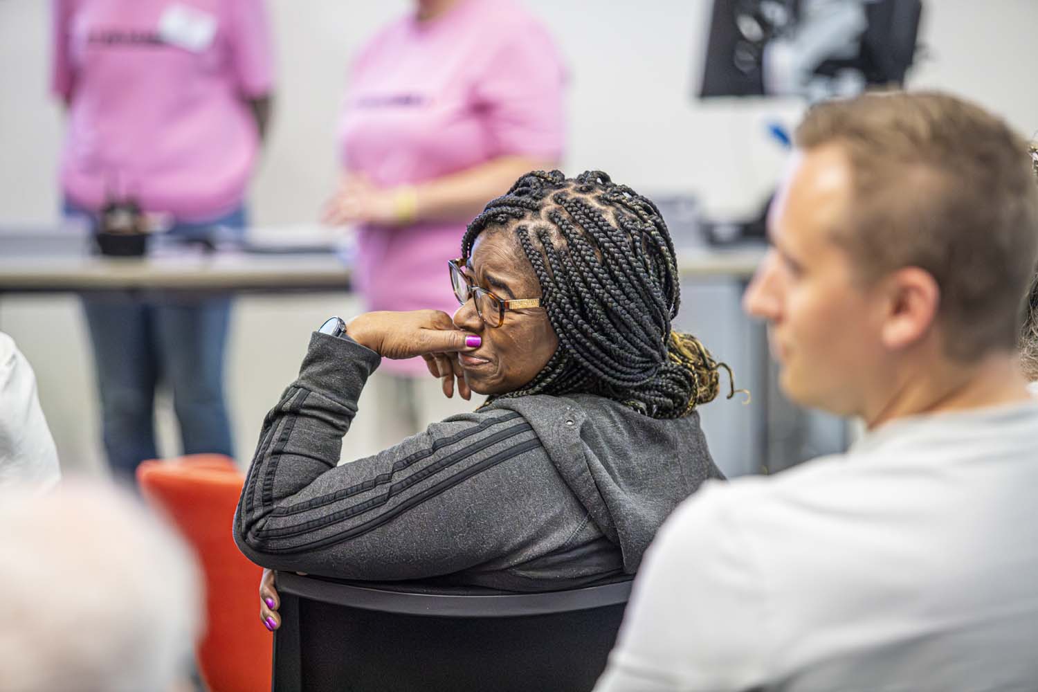 Workshop audience Yinka listening