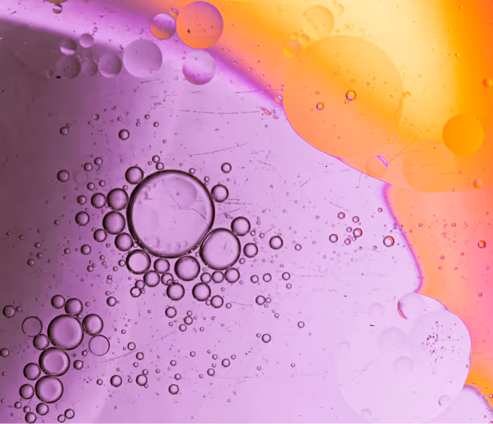 Macro picture of a purple and orange oil liquid