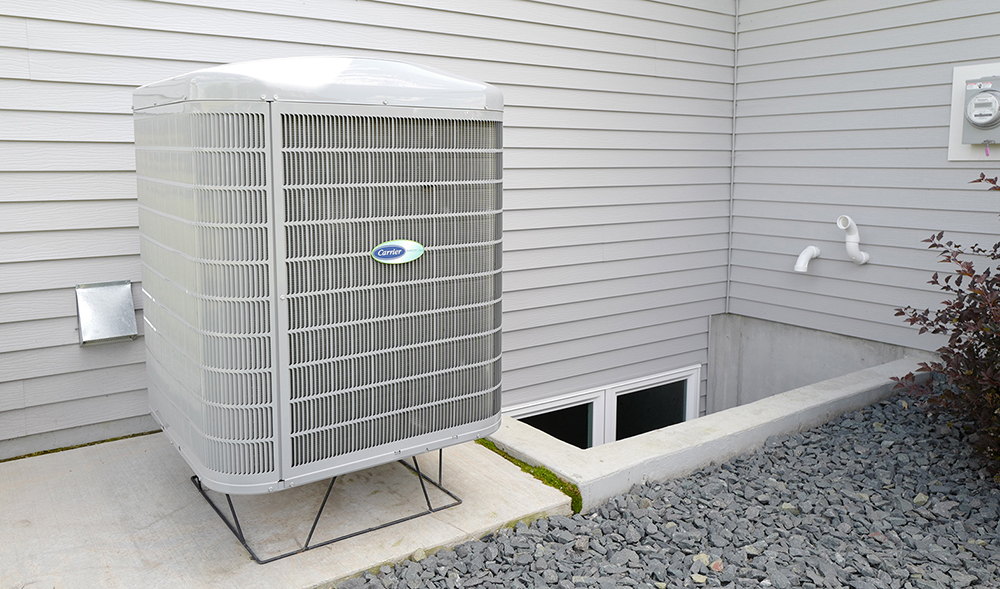 An air-source heat pump outside a home
