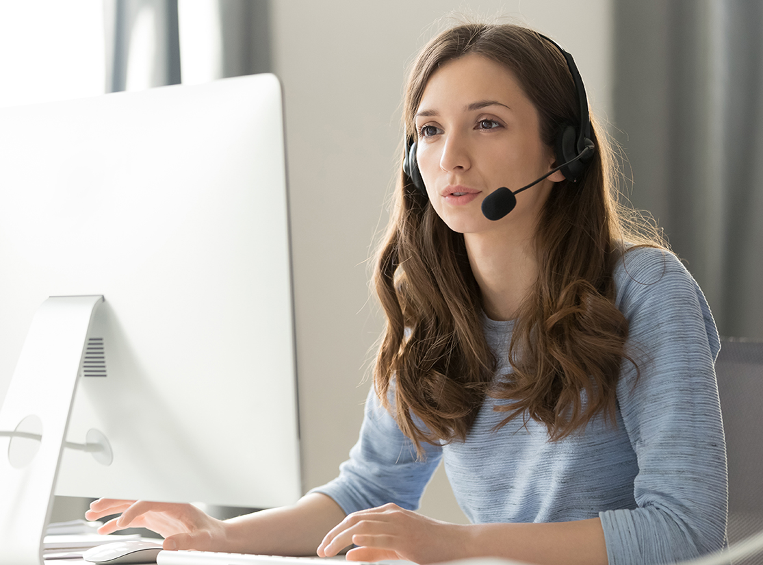 A women helping someone over the phone