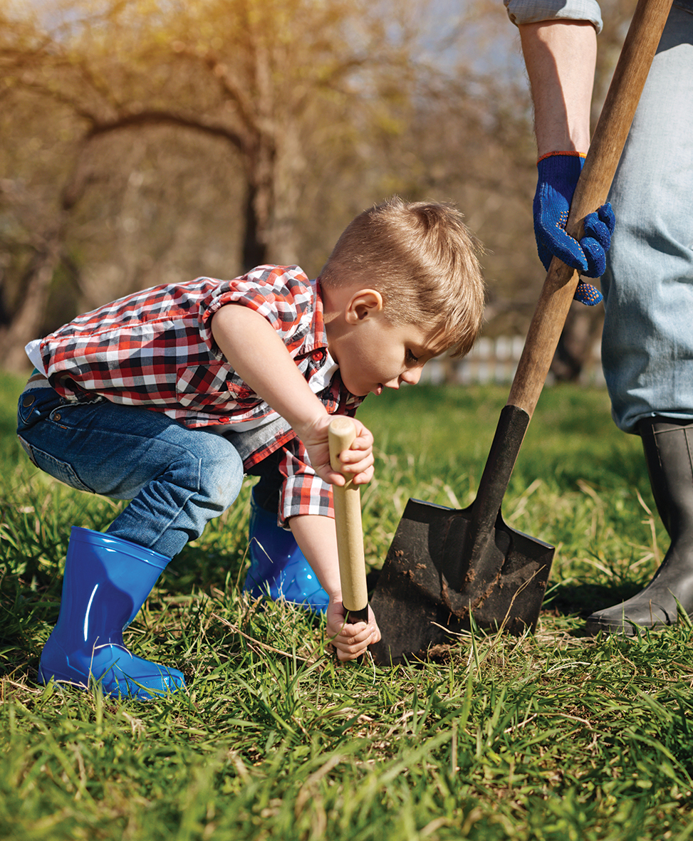 Child digging in the yard