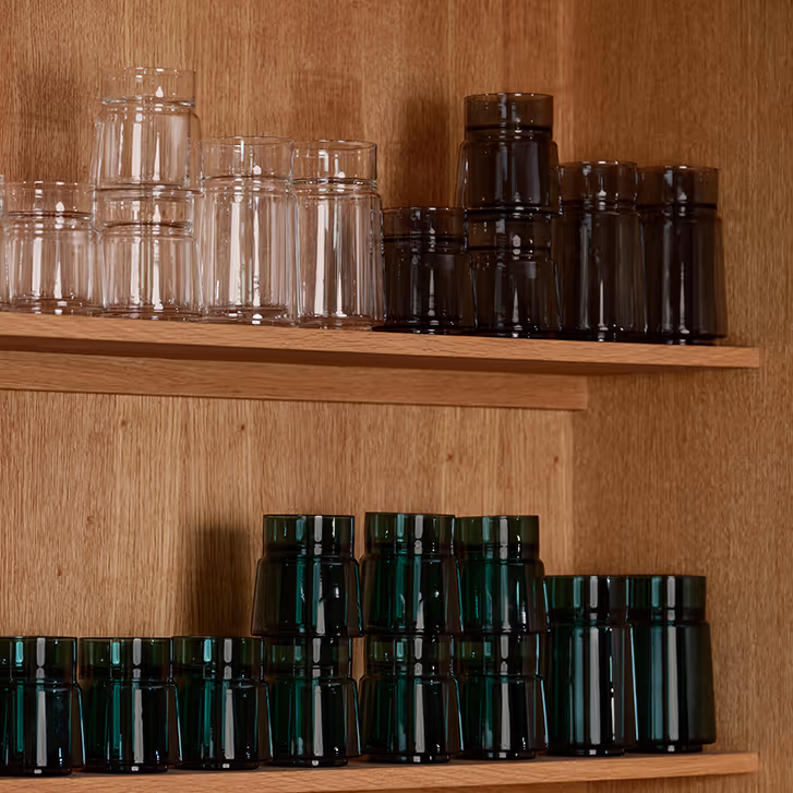 Double Wall Glasses stacked in Green, Clear and Black