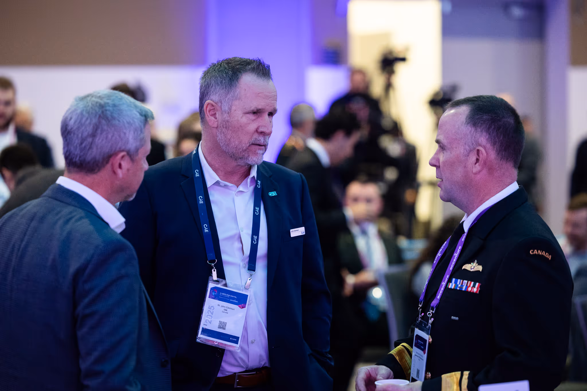 Military officer speaking at a podium during a session focused on digital innovation and cybersecurity.