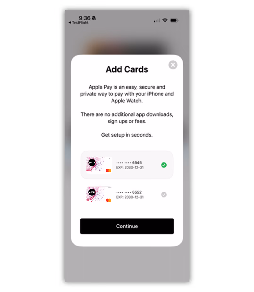 Mobile screen showing Apple Pay Add Cards interface with two prepaid cards listed, one selected, and a Continue button.