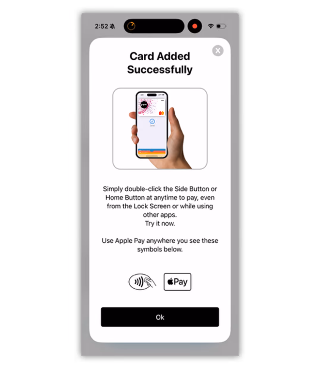 iPhone screen showing confirmation that a card was added successfully with instructions to double-click the Side or Home Button to pay and icons for contactless payment and Apple Pay.