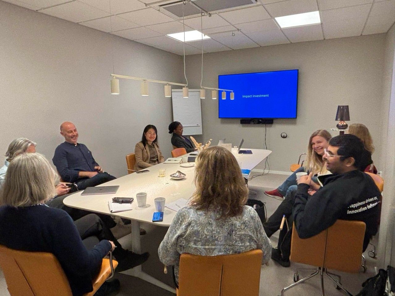 image of a business meeting (for a data analytics and business intelligence)