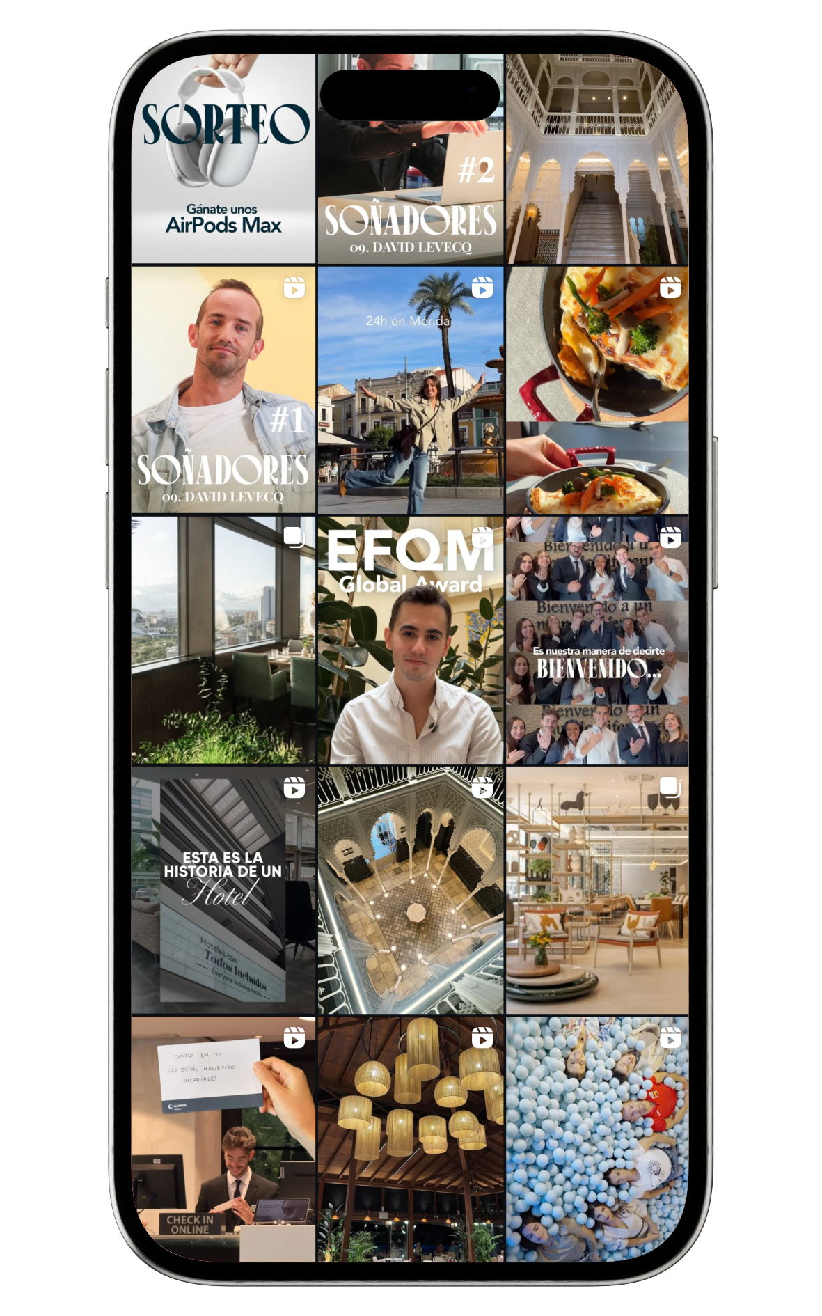Smartphone screen showing an Instagram profile grid with posts including a giveaway for AirPods Max, portraits of a man labeled David Levecq, food dishes, a scenic courtyard, indoor restaurant views, hotel reception, hanging lamps, and people in a ball pit.