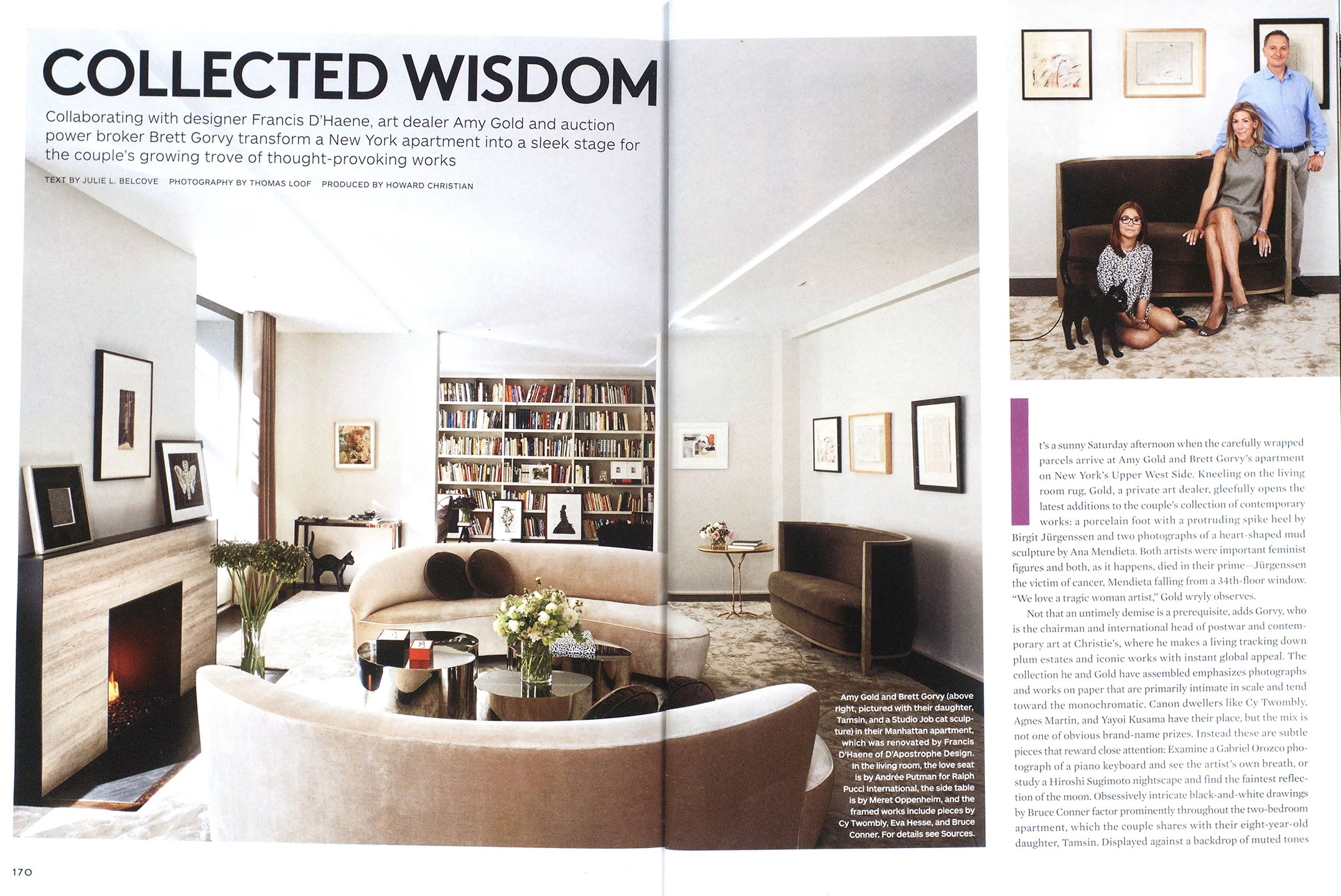 Magazine article featuring CNR Group NYC luxury home build interior: Elegant New York apartment living room with curved cream sofas, round metal coffee tables, a fireplace, and a large bookshelf filled with books and art.